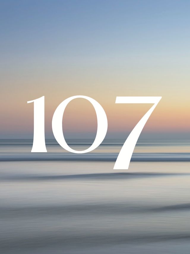 107 angel number on sunset background
