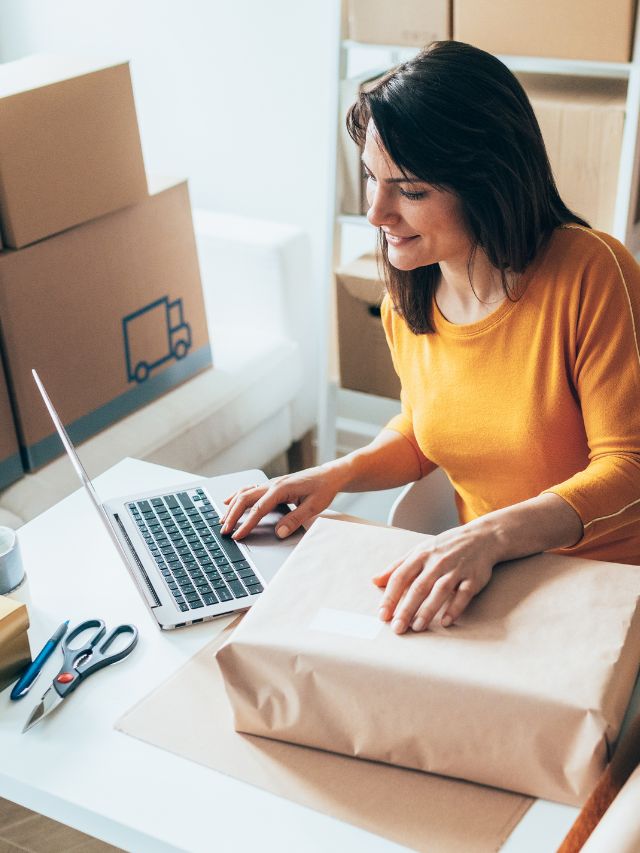 woman handling packages for business