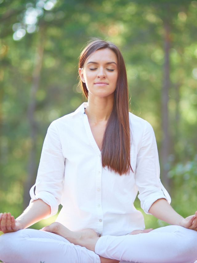 spiritual practice woman sitting in a lotus position
