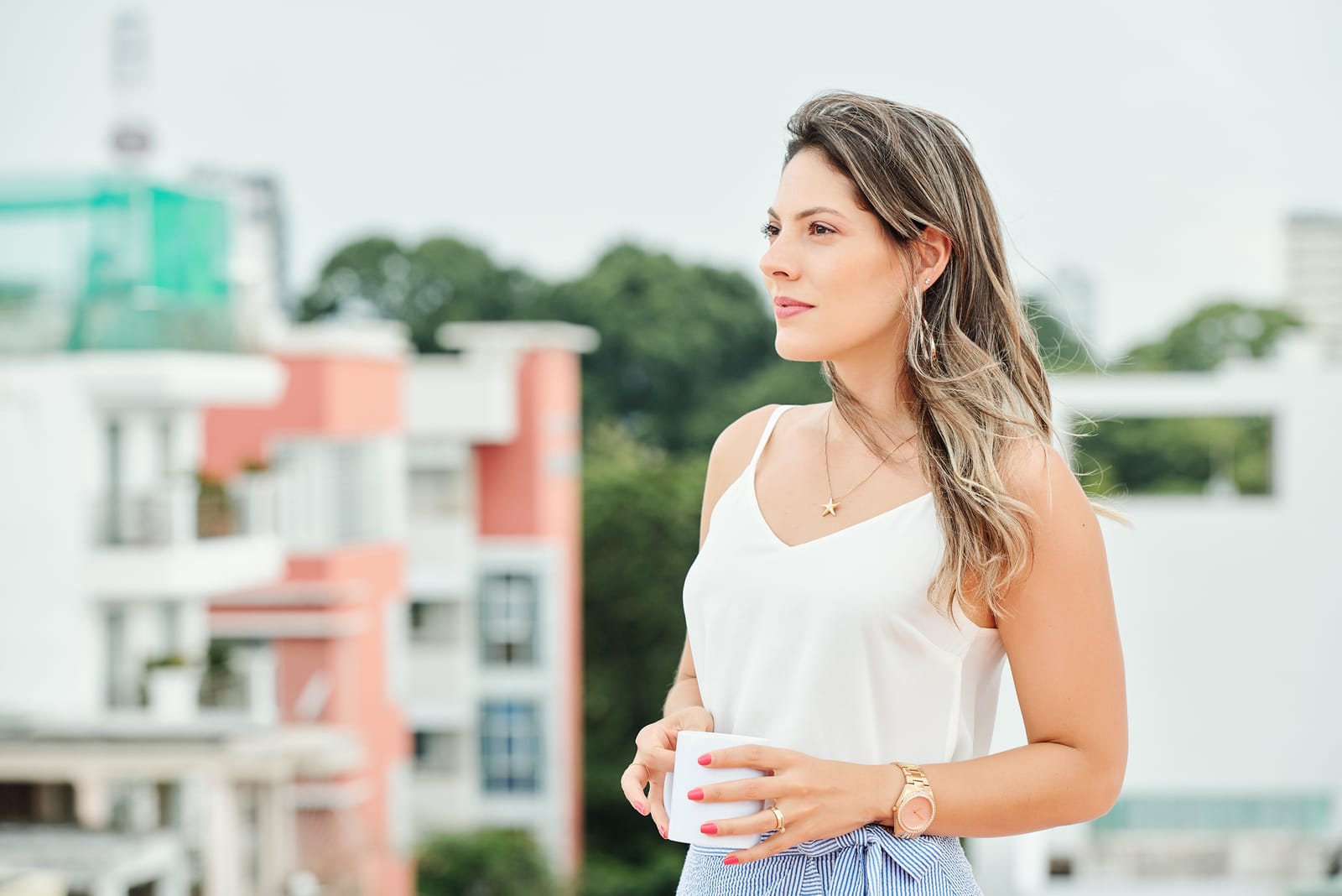 beautiful woman standing outdoors 