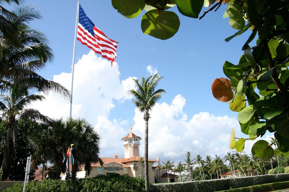 Flag, Sky, Tree, Architecture, Palm tree, Vacation, Arecales, Plant, Building, Tourism, 